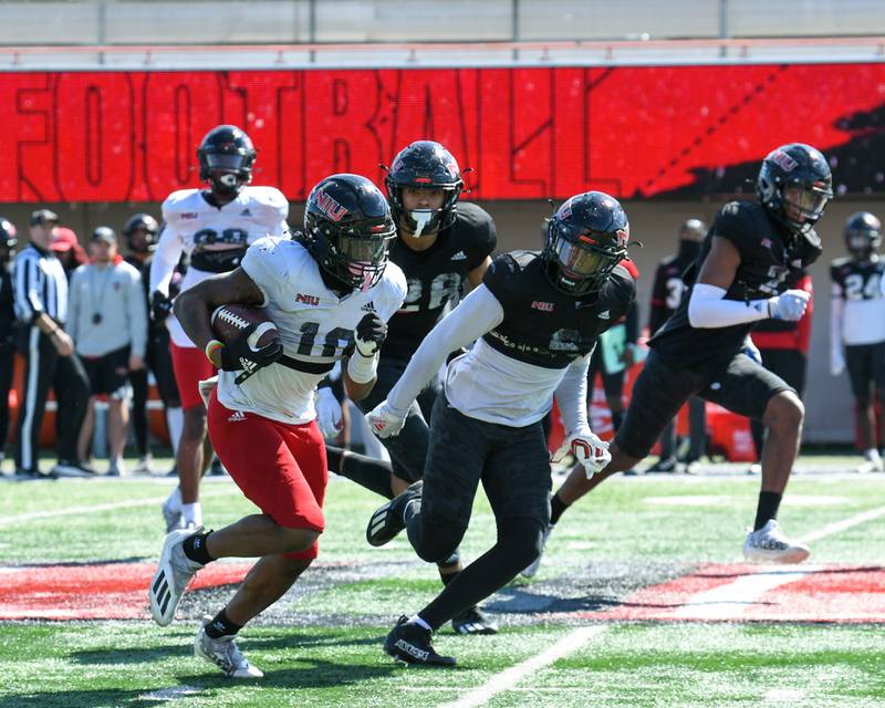 Northern Illinois University wide receiver Billy Dozier (10) gains some yards during the spring scrimmage at Huskie Stadium held on Saturday April 16th.