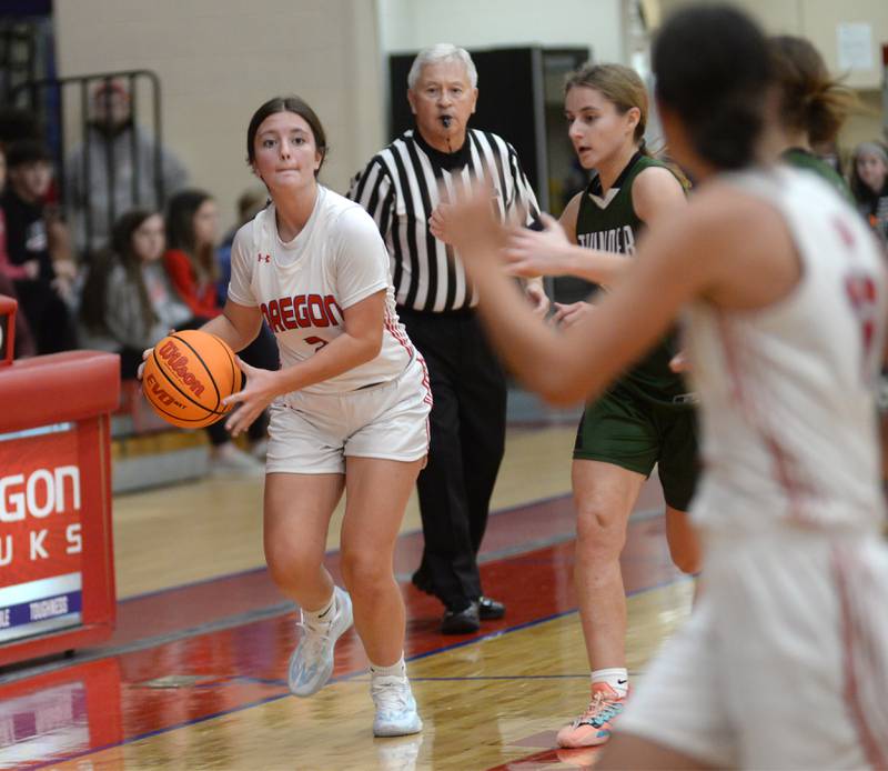 Oregon's Avery Kitzmiller (2) dribbles up the sideline against West Carroll at the Oregon Girls Basketball Tip-Off Tournament on Wednesday, Nov. 20, 2024 at the Blackhawk Center in Oregon.