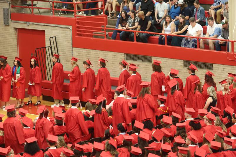 Ottawa High School Class of 2026 graduates begin to get their diplomas during the commencement ceremony in Kingman Gymnasium on Friday, May 22, 2026 at Ottawa High School