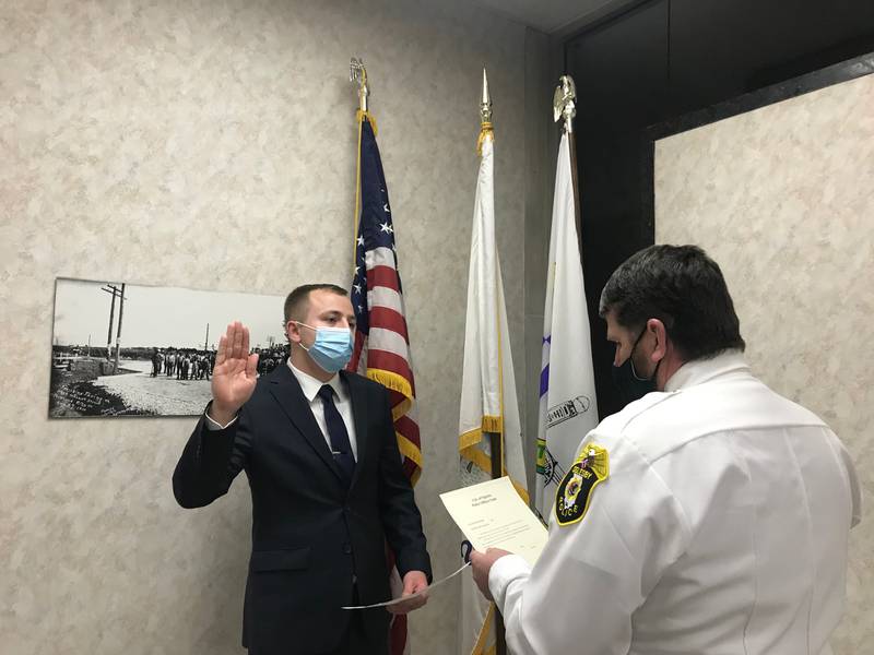 Oglesby swearsin new police officer Munoz Shaw Local