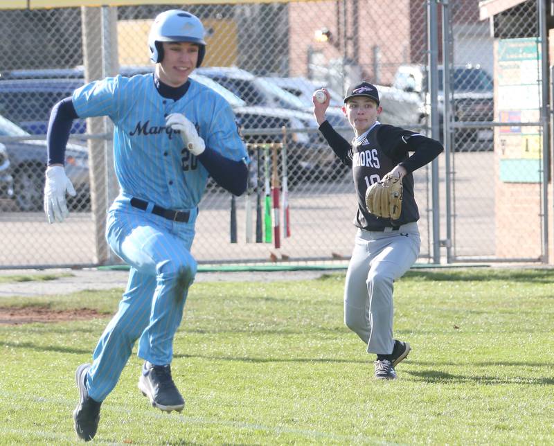 Woodland/Flanagan-Cornell's Tucker Hill throws out Marquette's Charlie Mullen at first on Wednesday, March 27, 2024 at Masinelli Field in Ottawa.