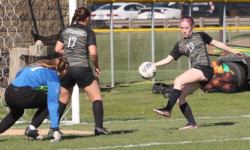 Sycamore's Cortni Kruizenga gets the ball past the Morris goalie during their Interstate 8 Conference Tournament semifinal game Wednesday, May 3, 2023, at Sycamore High School.