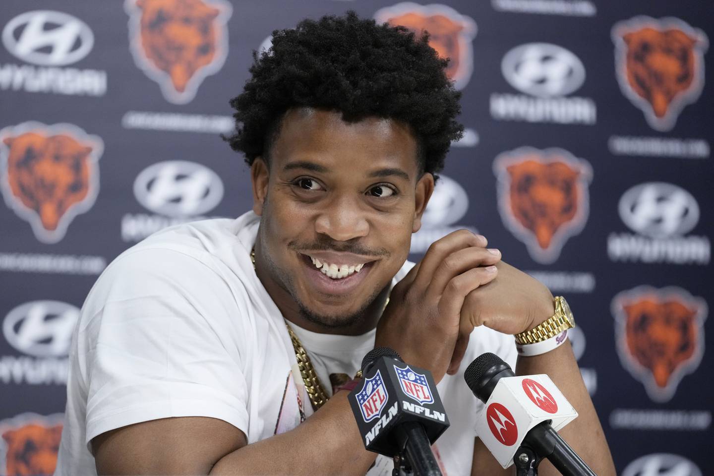 Chicago Bears defensive end DeMarcus Walker smiles as he listens to a question from media during a news conference, March 16, 2023, at Halas Hall in Lake Forest.