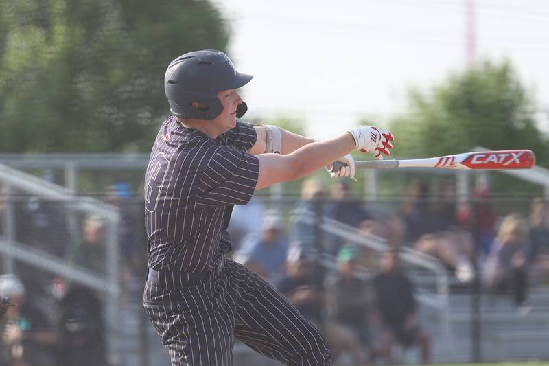 Lemont’s Conor Murray connects for a RBI double against Hinsdale South on Wednesday, May 24, 2023, in Lemont.