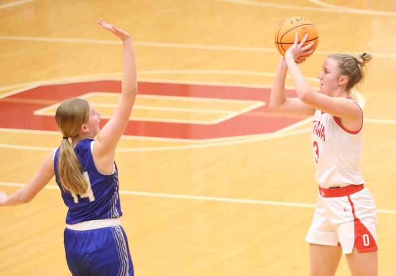 Ottawa's Skylar Dorsey looks to pass the ball over Princeton's Payton Brandt on Monday, Feb. 3, 2025 in Kingman Gymnasium at Ottawa High School.
