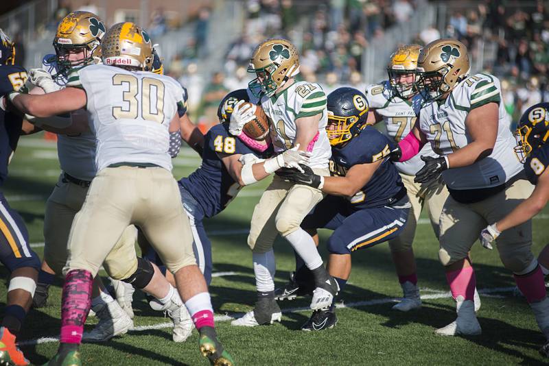 St Patrick's Trever Wozny runs up the middle against Sterling on Saturday, Oct. 30, 2021.