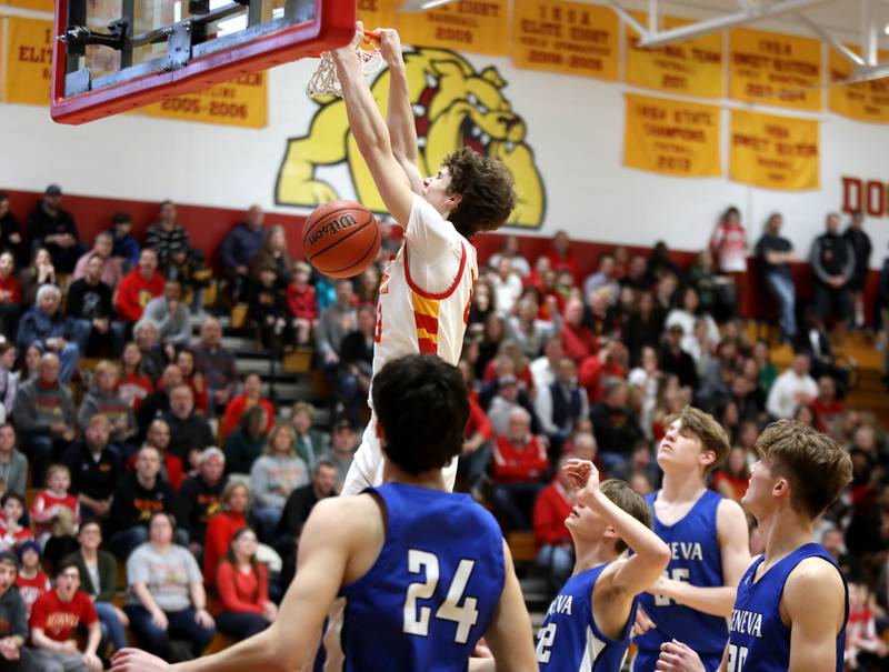 Batavia’s Jax Abalos dunks the ball during a game against Geneva at Batavia in February 2024.