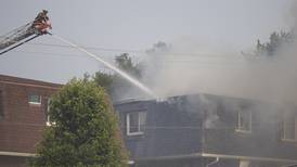 Joliet battalion fire chief rescues child, mother from apartment fire