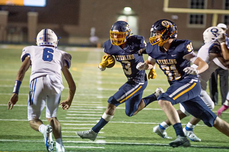 Sterling's Antonio Tablante turns the corner for yards Friday, Oct. 01, 2021, against Quincy.