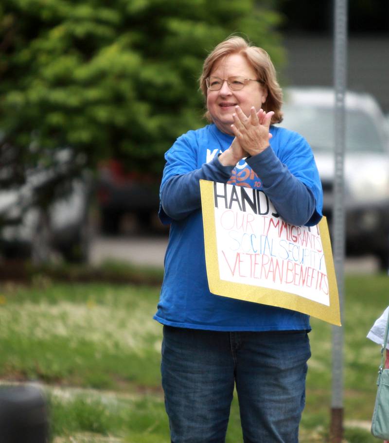Monita Gruhlke of Yorkville listens as U.S. Rep. Lauren Underwood (D-Naperville) speaks against cuts to the federal Older Americans Act at the Senior Services Associates community center in Yorkville.