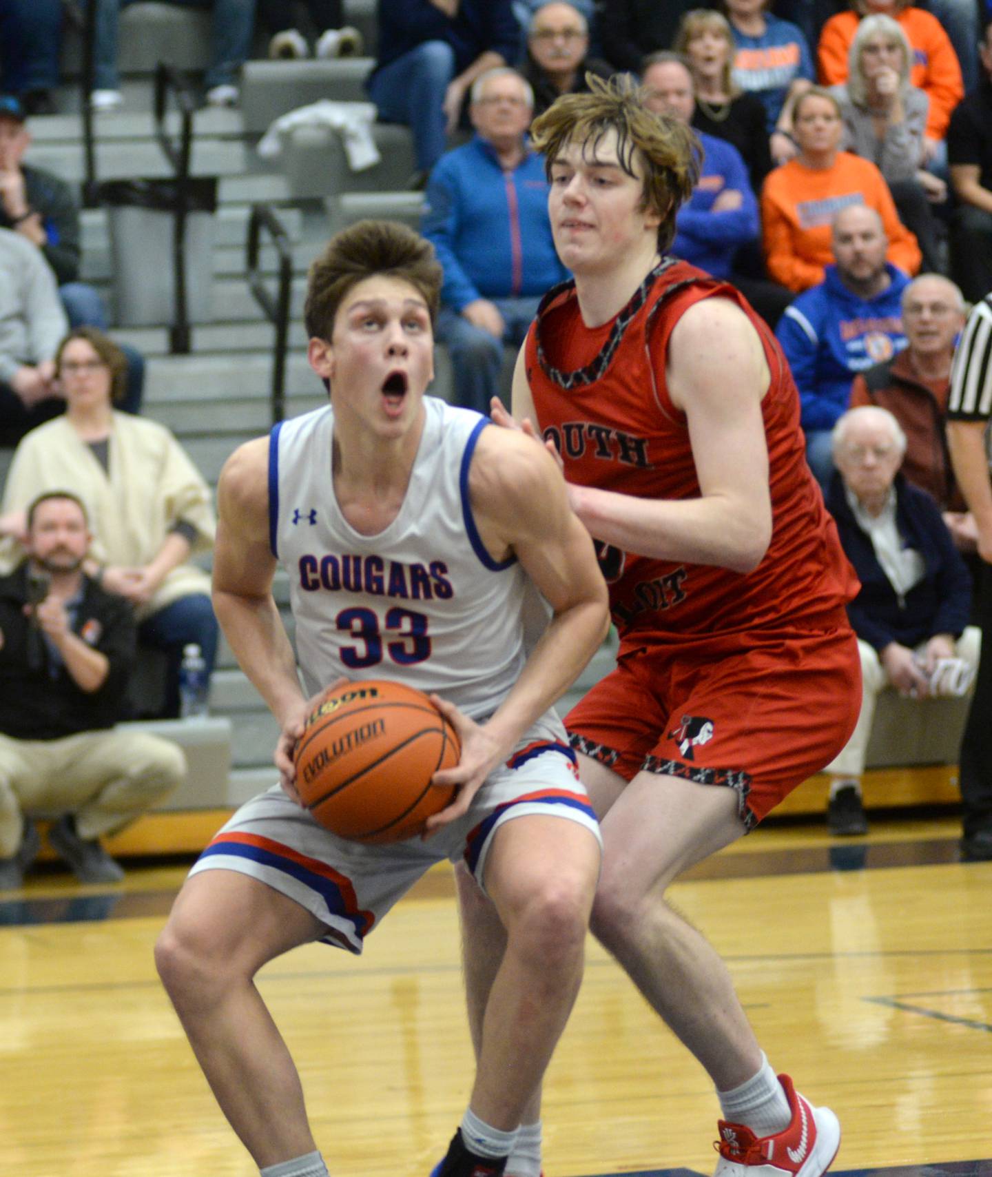 Eastland's Parker Krogman (33) gets ready to put up a shot as South Beloit's Ross Robertson (2) defends on Tuesday, Feb. 27, 2024 action at the 1A River Ridge Sectional in Hanover.