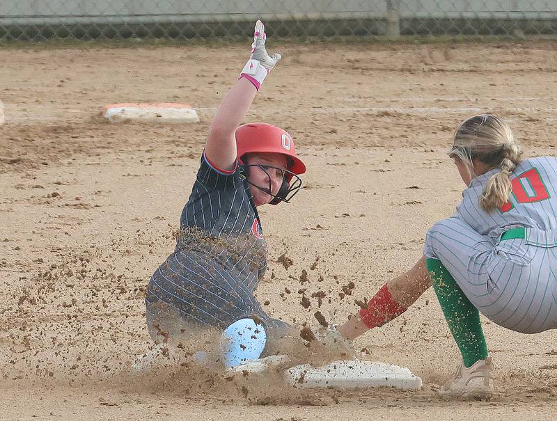 Ottawa's Reese Purcell steals a base against L-P's Kelsey Frederick on Tuesday, April 14, 2026 at Ottawa High School.