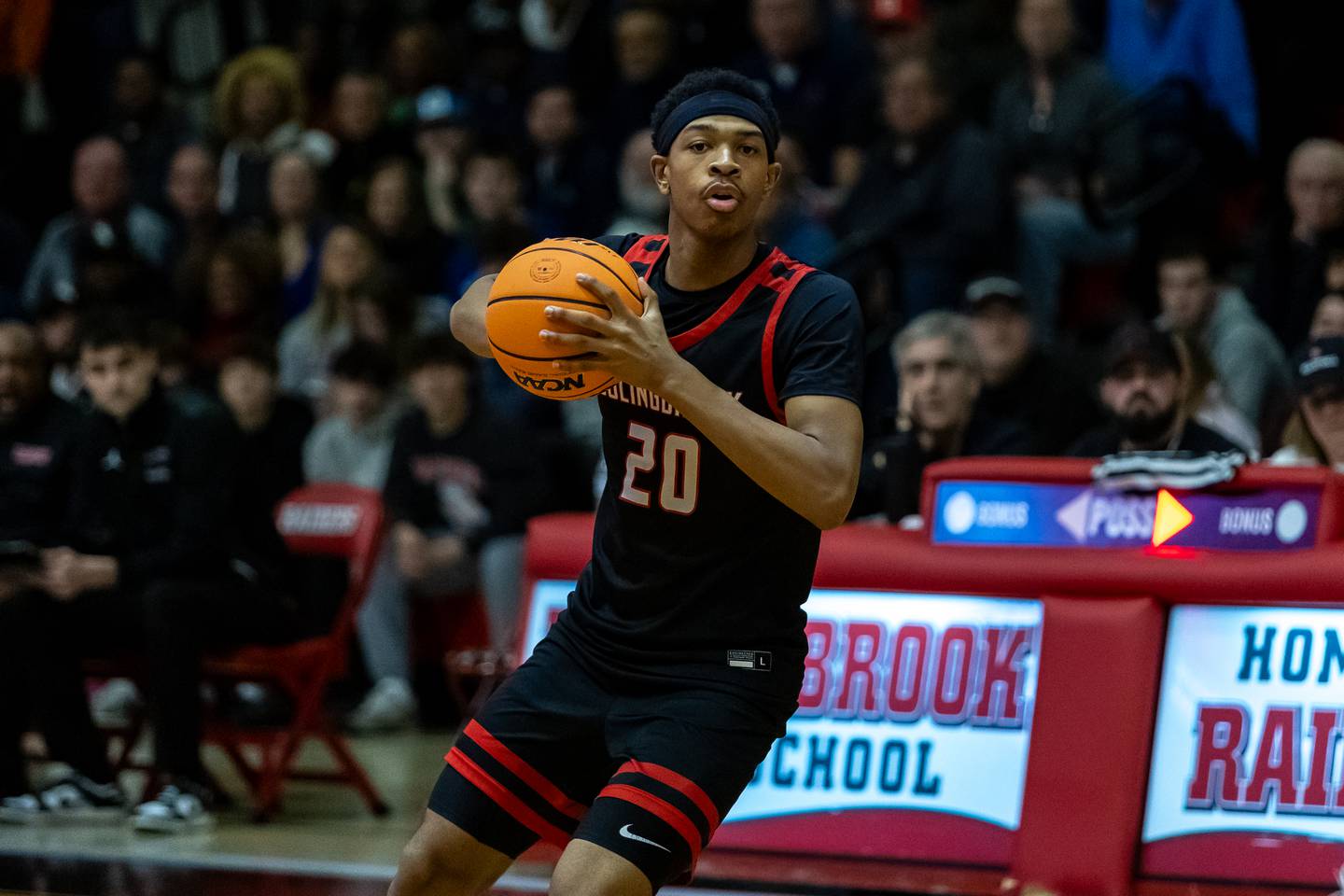 Bolingbrook's Isaiah Rogers looks for an open teammate during the 4A Bolingbrook Sectional semifinal boys basketball game against Neuqua Valley in Bolingbrook on March 4, 2026.