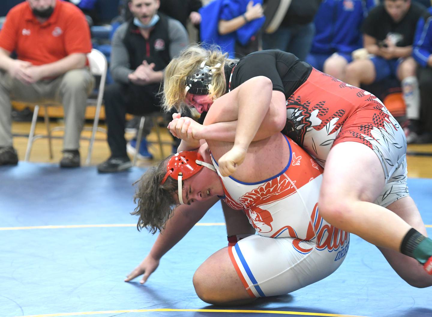 Erie's Elijah Friedrichsen drives Oregon's Evan Flaharty into the mat en route to winning the 285-pound title match at the Polo Wrestling Invitational.