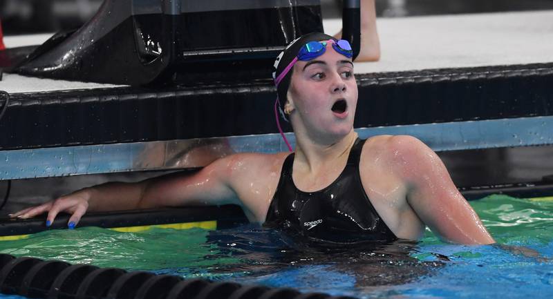 Rosary’s Paige Kowal reacts to her first-place finish in the 200-yard freestyle during the girls state swimming preliminaries at the FMC Natatorium on Friday, Nov. 14, 2025 in Westmont.