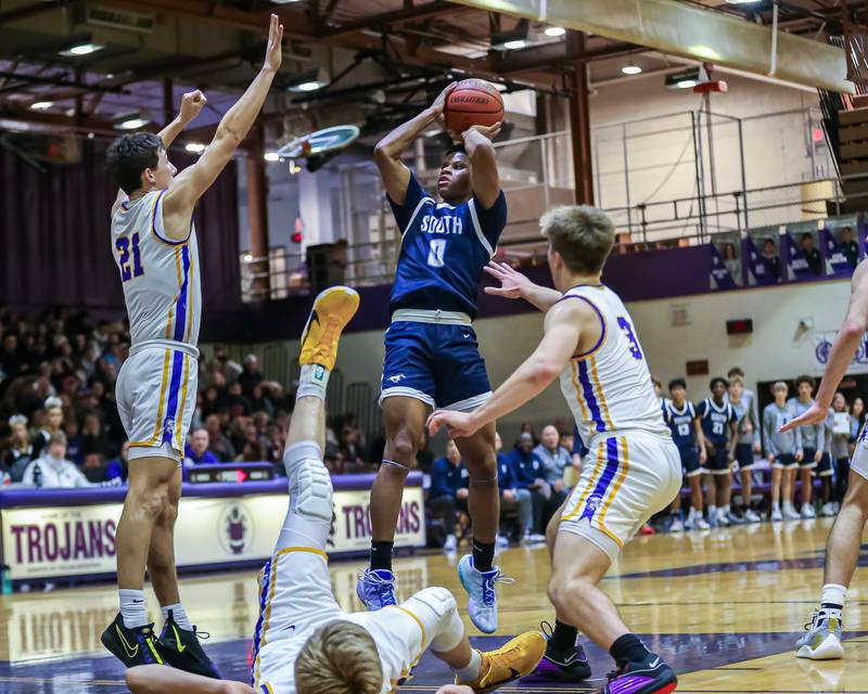 Downers Grove South's Jalen House (0) shoots a jump shot during basketball game between Downers Grove South at Downers Grove North. Dec 16, 2023.
