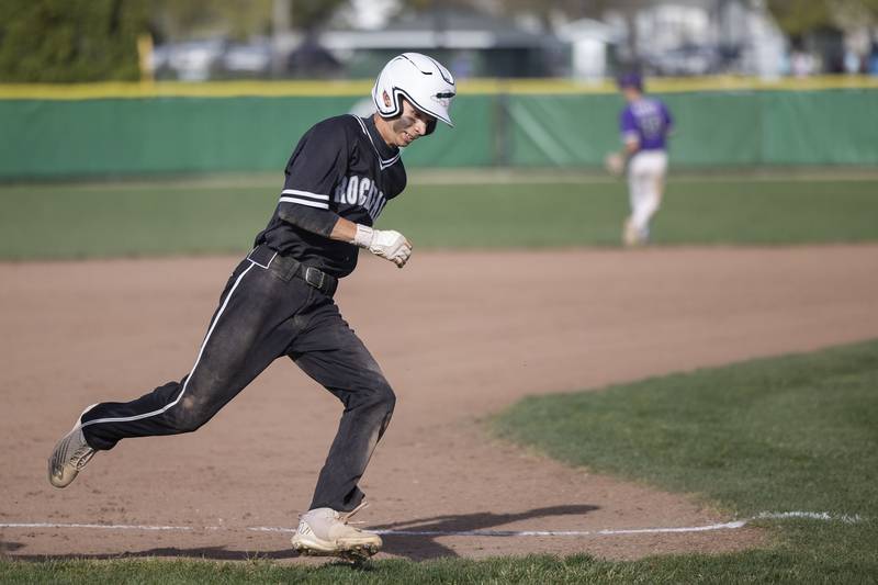 Rock Falls’ Victor Rivera rounds third to score against Dixon on Tuesday, April 18, 2023.