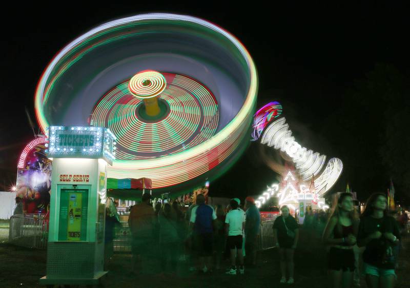 A eight-second exposure of the Graviton and Zipper carnival rides during the 170th annual Bureau County Fair on Saturday, Aug. 23, 2025 in Princeton.
