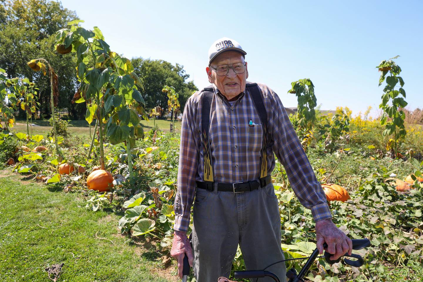 Glenn Anderson, 95, a retired Kempton-area farmer, visits his pumpkin patch near his current residence at Riverside's Westwood Oaks Independent Living in Kankakee where he grows the gourds for auction every three years to benefit the senior living community's garden club. This year's auction takes place on Saturday, Sept. 27 at 10 a.m. at the 100 Westwood Oaks Court location.