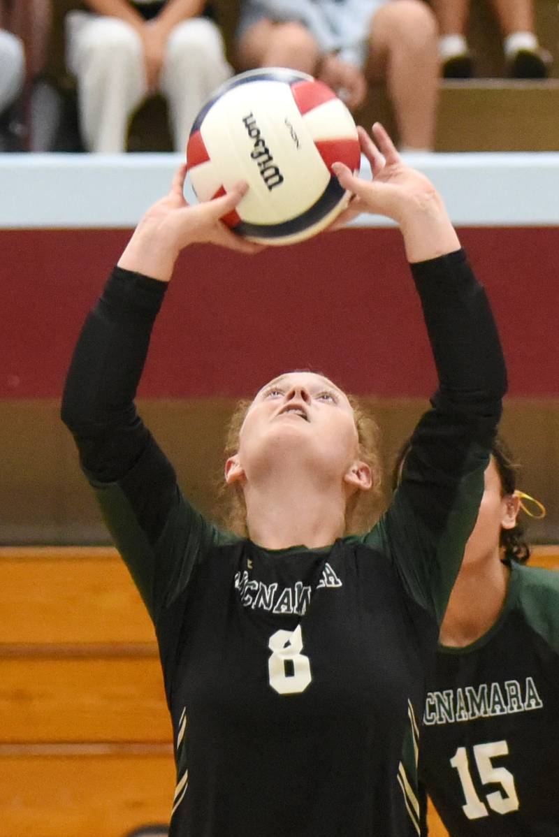 Bishop McNamara's Jessica Born sets the ball during an All-City game at Kankakee Wednesday, Sept. 3, 2025.