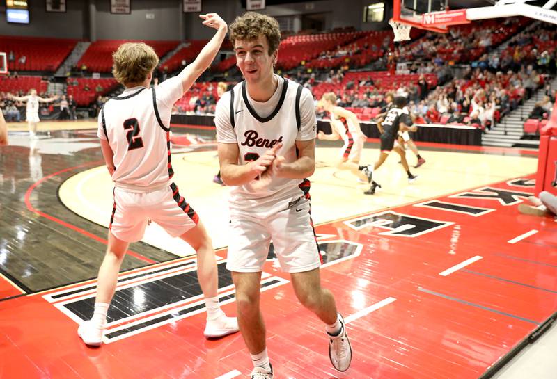 Benet’s Niko Abusara (right) tries to pass the ball away from Rockford Auburn’s Keon Leach (left) during the Class 4A NIU Supersectional against in DeKalb on Monday, March 6, 2023.