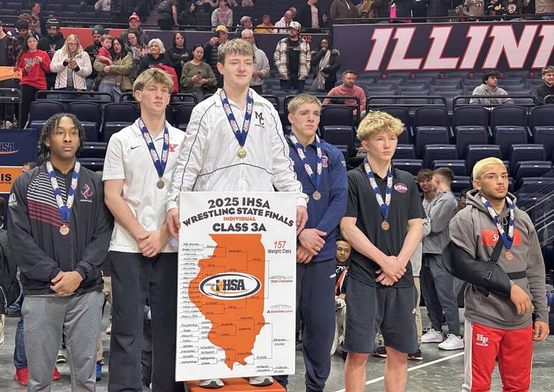 Yorkville's Jack Ferguson (second from left) poses with fellow All-State finishers from the Class 3A 157-pound weight class Saturday at the 2025 IHSA boys wrestling Individual State Finals in Champaign.