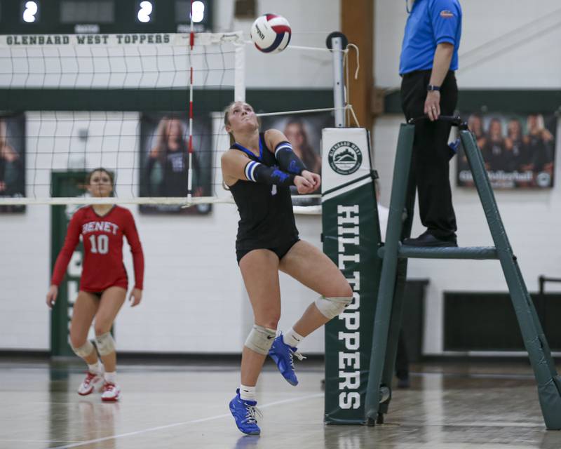 St Charles North's Mia McCall (7) digs out a ball during Class 4A Glenbard West Sectional final volleyball match between St Charles North at Benet. Nov 6, 2025 in Glen Ellyn.