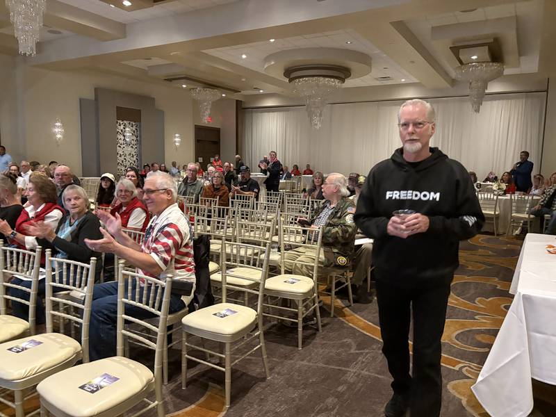 Pastor Scott Barrettsmith walks up to the stage during a MCGOPAC event in memory of Charlie Kirk Oct. 14, 2025.