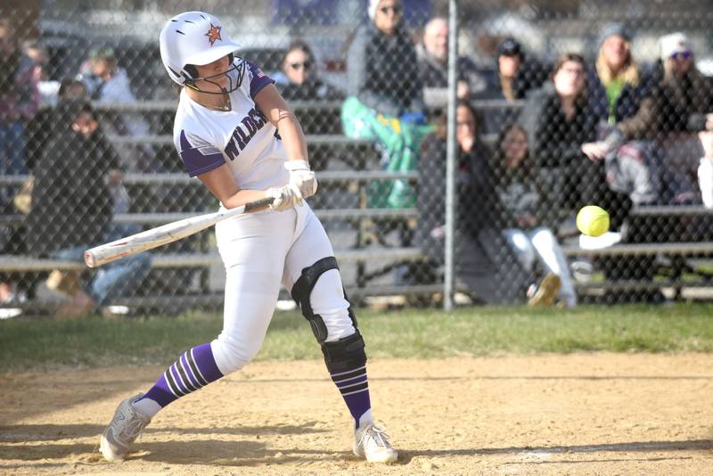 Wilmington's Madisyn Rossow hits a pitch for a grand slam during a home game against Herscher Tuesday, April 15, 2025.