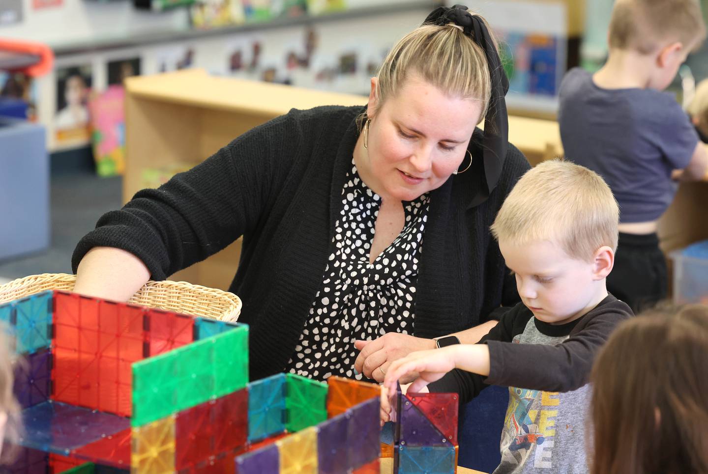 Laurel Copeland, Little Spartans Early Learning Program teacher at South Prairie Elementary School, works with student Logan Marry Wednesday, April 6, 2023, at the school in Sycamore.