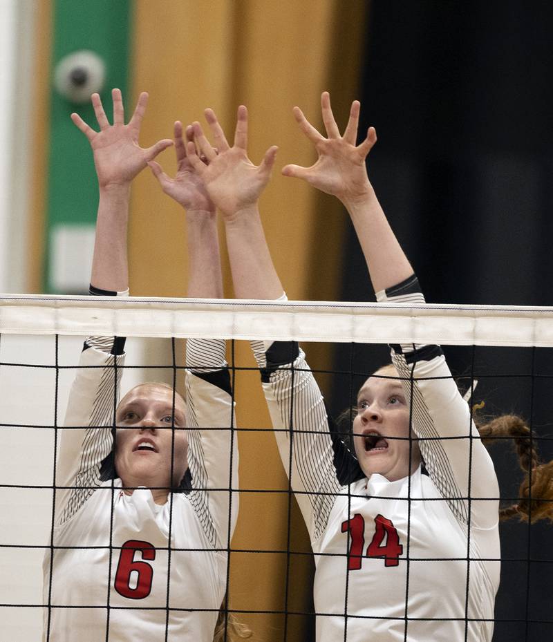Erie-Prophetstown’s Kaylee Keegan (left) and Eden Jensen go for a block against Oregon Tuesday, Oct. 28, 2025, in the Class 2A regional semifinal at Rock Falls.
