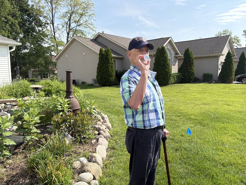 Veteran Ben Jankowski shows off a challenge coin June 6, 2025.