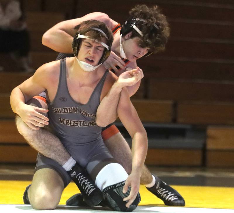 Jacobs’ Owen Piazza, front, battles Crystal Lake Central’s Tyler Porter at 175 pounds in varsity wrestling on Thursday, Jan. 16, 2025, at Jacobs High School in Algonquin.
