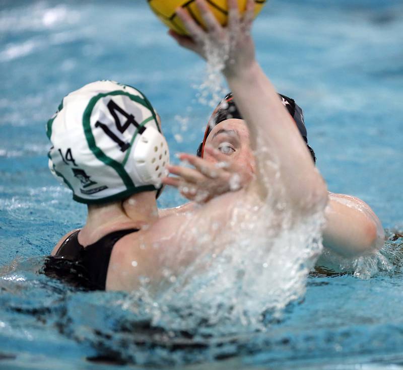Hersey's Victoria Wrona (12) defends aganist YorkÕs Natalie Tuerk (14) during the IHSA State Water Polo consolation match Saturday May 20, 2023 at Stevenson High School in Lincolnshire.