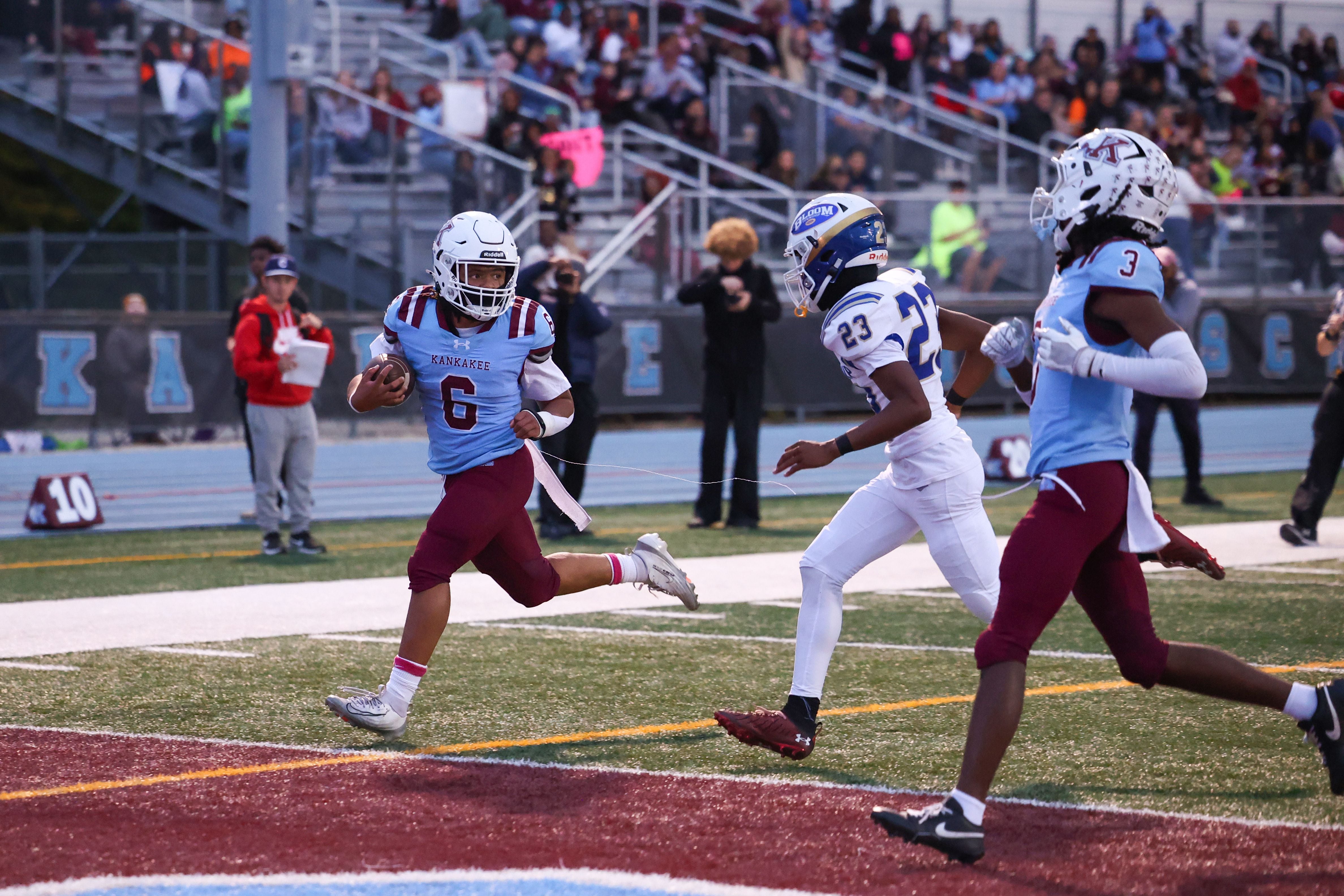 Kankakee's Zayden Henley runs in a touchdown during the Kay's victory over Bloom on Friday, Oct. 10, 2025.