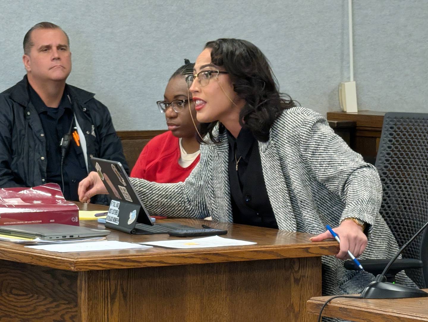 Attorney Cierra Norris (right) argues a point during a hearing Jan. 23, 2026, for her client Xandria Harris. (seated next to Norris).