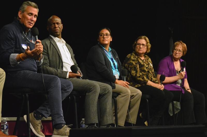 How do we fix homelessness? Carol Alcorn (second from right), executive director of Public Action to Deliver Shelter, invited regional homeless advocates to speak Thursday, Nov. 7, 2024, at Illinois Valley Community College. Panelists agreed the key is taking a holistic approach aimed at helping individuals one-on-one with their various needs. Speaking is Jon Rocke, executive director of Pathway Ministries in Peoria.