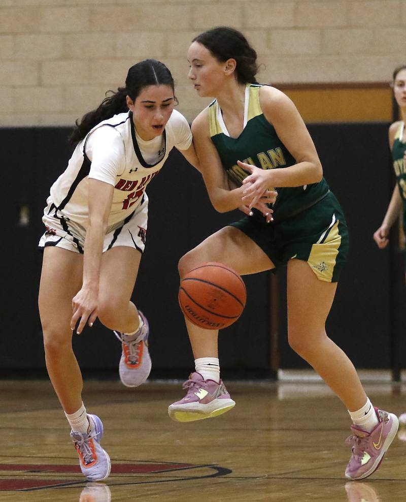 Huntley's Jessica Ozzauto tries to steal the ball from Boylan's Mary Rose during a Dundee-Crown Thanksgiving Girls Basketball Tournament basketball game Wednesday, Nov.. 16, 2022, between Huntley and Boylan at Huntley High School.