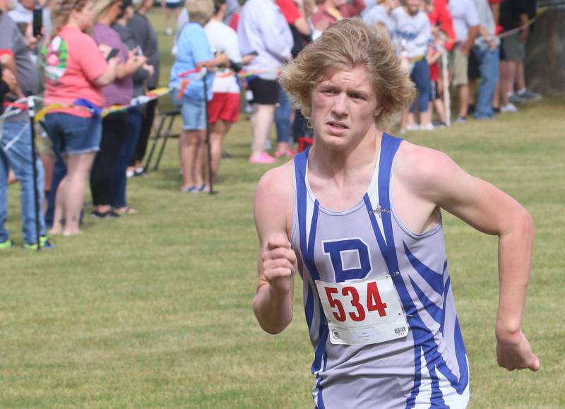 Princeton's Augustus Swanson races during the Gary Coates Invitational cross country meet on Saturday, Sept. 13, 2025 at Zearing Park in Princeton .