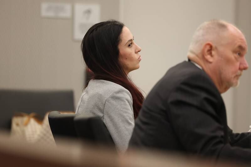 Erin Zilka sits with her attorney Jeff Tomzcak at her trial at the Will County Courthouse on June 27th, 2023 in Joliet. The former Joliet police officer Erin Zilka is on trial on aggravated DUI charges following a deadly 2020 crash where her passenger, Berwyn police officer Charles Schauer, 33, of Glen Ellyn, was killed.