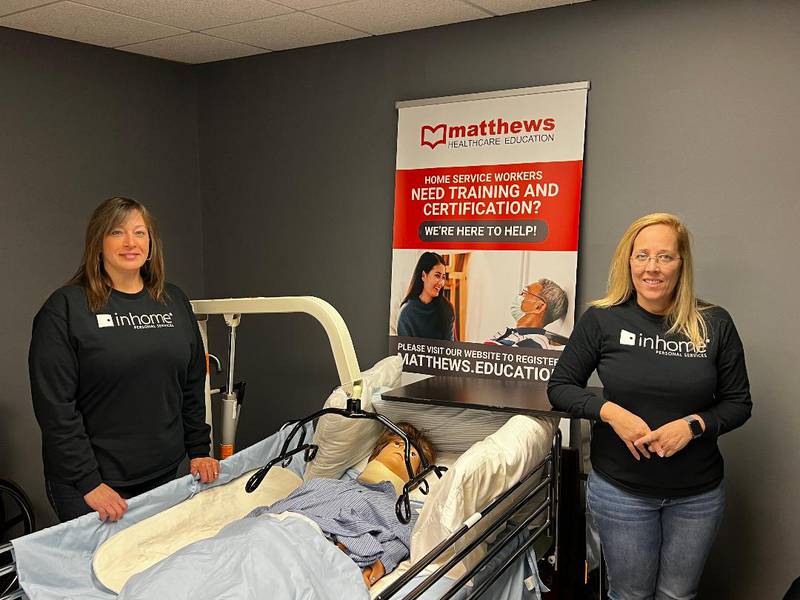 Janet Nohai, regional director of services, at left, and Penny Avila, director of services for Sterling, stand next to a mock patient in the on-site training facility to learn proper care techniques so its caregivers can be Matthew's certified. In Home Personal Services opened a Sterling location.