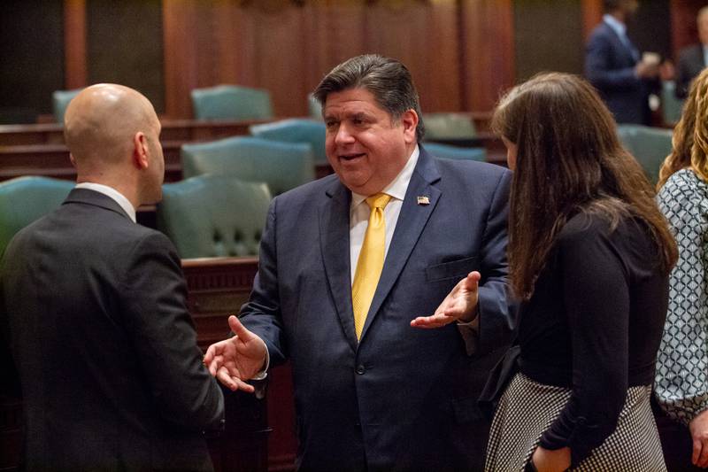 Gov. JB Pritzker is pictured on the House floor on Thursday, April 19, 2024. He is pushing a plan to address Illinois’ chronically underfunded pension systems, but a looming legal issue could sidetrack that goal.