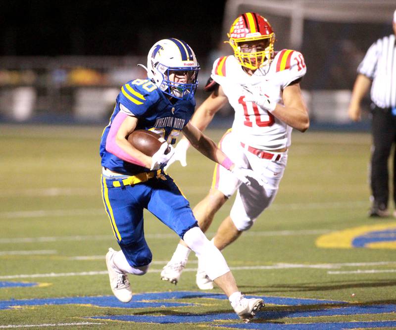 Wheaton North’s David Hyde carries the ball during a game against Batavia on Friday, Sept. 27, 2024 at Wheaton North.