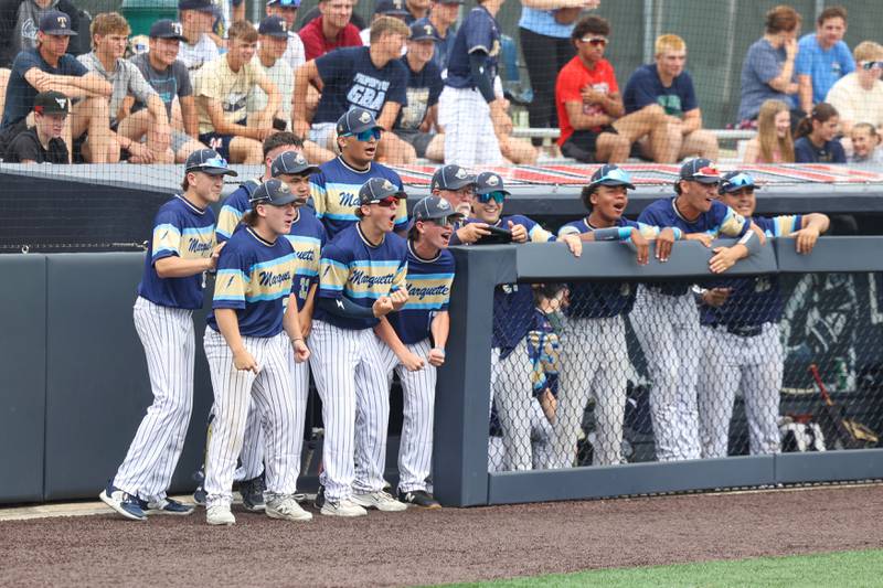 Ottawa Marquette players cheer as they near a 10-run second inning during the Crusaders' 16-1 victory over Lexington in the IHSA Class 1A State semifinal on Friday, June 6, 2025.