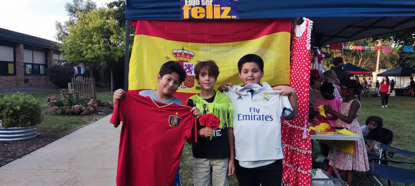 Jefferson Elementary School students enjoy soccer and flamenco at the Spain tent during the school's annual Multicultural Night in DeKalb on Sept. 13, 2024.