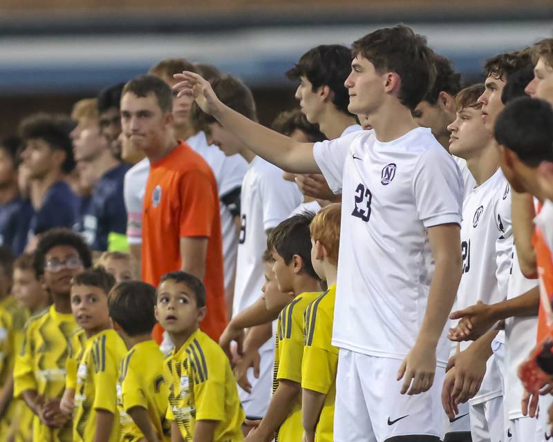 Pregame introductions before soccer match between Downers Grove North at Downers Grove South. Oct 2, 2025.