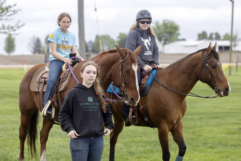Bethany Odle of Paw Paw talks about the care and feeding of her two horses, Alibi and Whiskey, Friday, April 24, 2026, at the Lee County Fairgrounds.