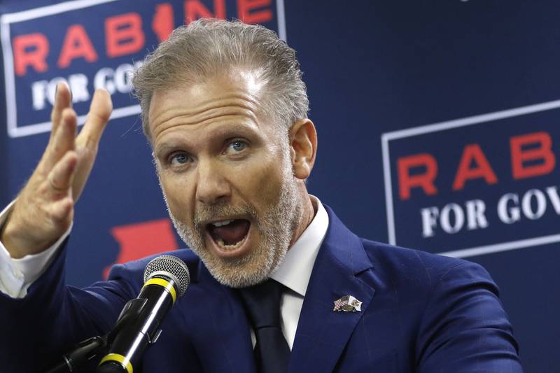 Gary Rabine chants his campaign slogan, "paving the way to stay," during an official announcement of his candidacy for governor of Illinois