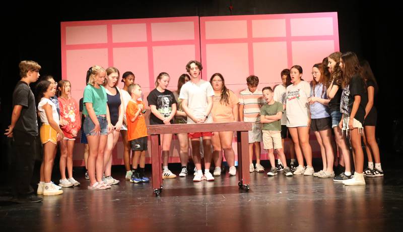 The cast of Beatlejuice act out a scene on Tuesday, July 29, 2025 at Stage 212 in La Salle.