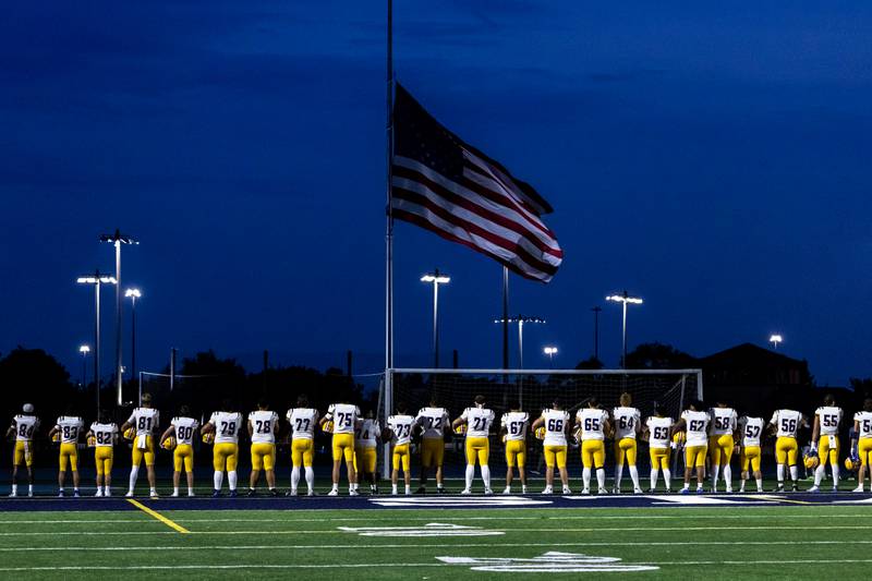 Lyons Township’s varsity football prepares for a varsity football game against Joliet Catholic at Busey Bank Field at Joliet Memorial Stadium on Aug. 29, 2025.